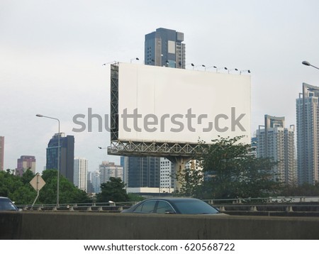 Green color screen billboard in city