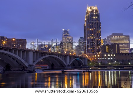 Medium Shot of Minneapolis Reflecting in the Mississippi River's Lock and Dam System