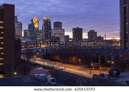 Cityscape of Downtown Minneapolis and Long Exposure Traffic Trails at Dusk in Minnesota