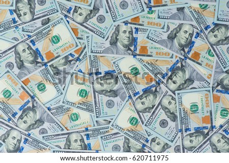 background from scattered dollar banknotes as abstract seamless