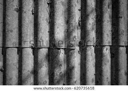 Corrugated old roof texture. Image includes a effect the black and white tones.
