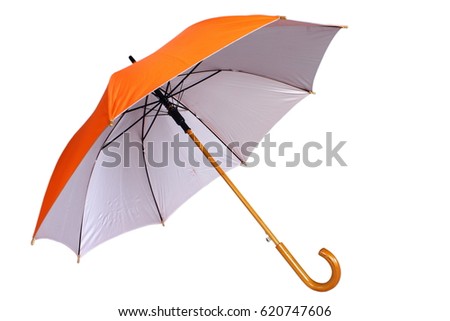 Orange umbrella isolated on white background Royalty-Free Stock Photo #620747606