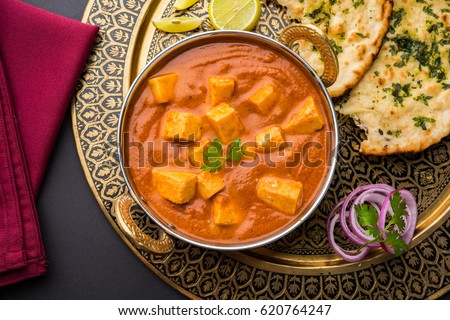 paneer butter masala or cheese cottage curry, popular indian lunch/dinner menu in weddings or parties, selective focus Royalty-Free Stock Photo #620764247