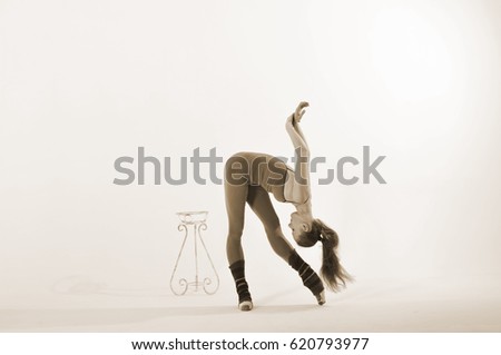 ballerina in overalls on a white background