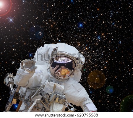 Astronaut in the outer space. Stars on the background . "The elements of this image furnished by NASA"
