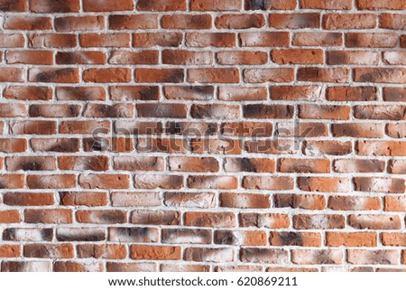 red brick wall texture grunge background with vignetted corners, may use to interior design
