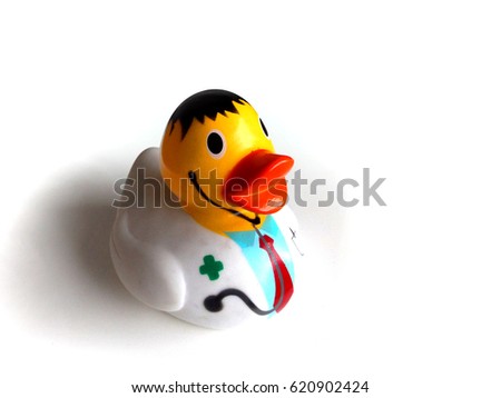 Rubber doctor bath duck on white background