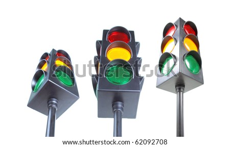 traffic light with red, yellow and green light in three different low angle shot