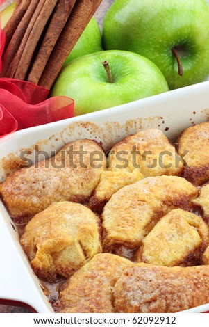 Apple dumplings. Apples wrapped in crescent roll dough and baked in butter, cinnamon, sugar and citrus pop.