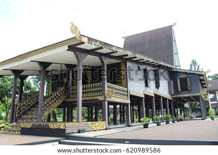 replicas of traditional houses trdisional southern Kalimantan Royalty-Free Stock Photo #620989586