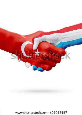 Flags Republic of Turkey, Luxembourg countries, handshake cooperation, partnership, friendship or sports team competition concept, isolated on white