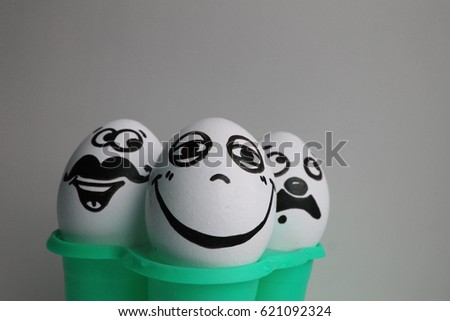 Eggs with a cute face. Photo for your design. three eggs. Concept: mustache and smile