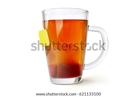 Tea glass cup with tea bag. Tea cup isolated on white background. Royalty-Free Stock Photo #621133100