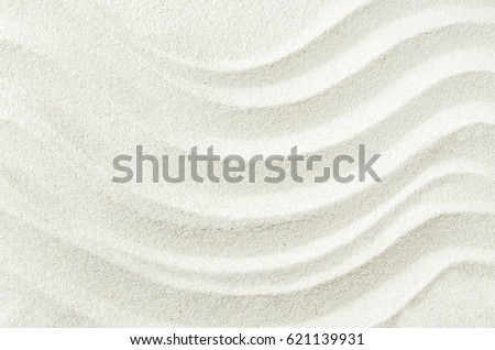 White sand texture background with wave pattern Royalty-Free Stock Photo #621139931