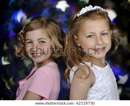 photo cute formal picture of young sisters portrait