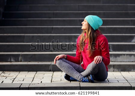 Yoga woman on a urban background