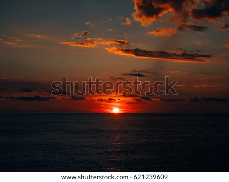 Sunset over the sea. Sunset over the Adriatic Sea. Sun to sit down in the water