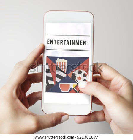 Hands holding mobile phone of movies theatre media entertainment