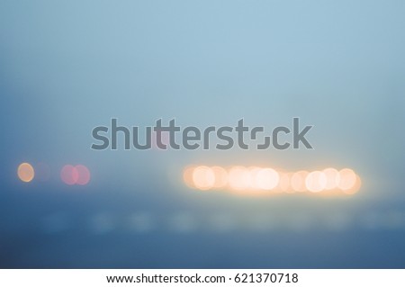 Abstract photo of blurred street lights in evening