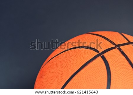 Basketball in front of a black background