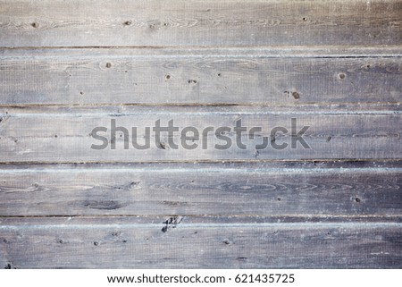 Gray and greyish background composed of wooden planks painted