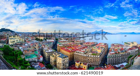 Panoramic seascape of Naples, view of the port in the Gulf of Naples, Torre del Greco, and Mount Vesuvius. The province of Campania. Italy. Royalty-Free Stock Photo #621490019