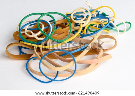 close up view of different coloured rubber bands