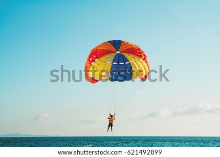 Parasailing at  Beach in Pattaya Thailand Royalty-Free Stock Photo #621492899
