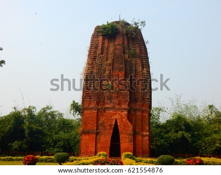 Sat Deoul , ancient ruined temple of 1000 AD at West Bengal , India . Deoul is a local term in West India and Bengal for the tower of a Hindu temple.