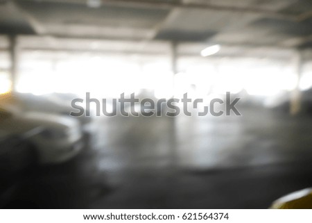 Picture blurred for background abstract and can be illustration to article of Cars parked in the parking lot