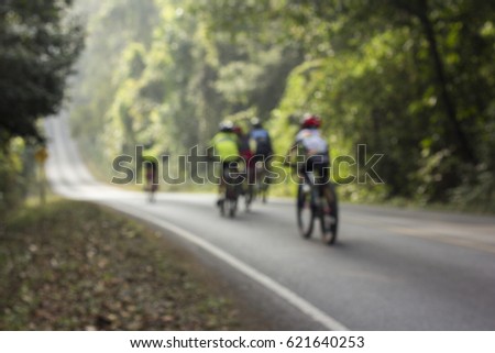 Blur image,Tree lined streets and bicycling streets, mountain bikes