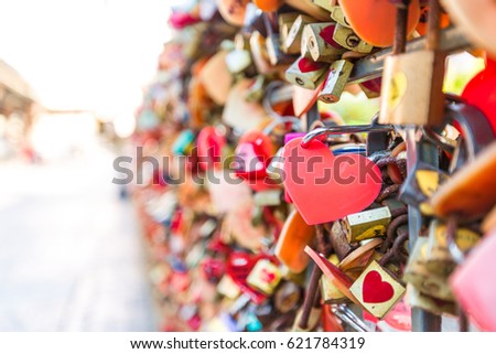 Heart shape Key chain at fence for making a wish of love, valentine, copy space