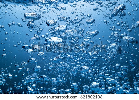 BUBBLES IN BLUE WATER
