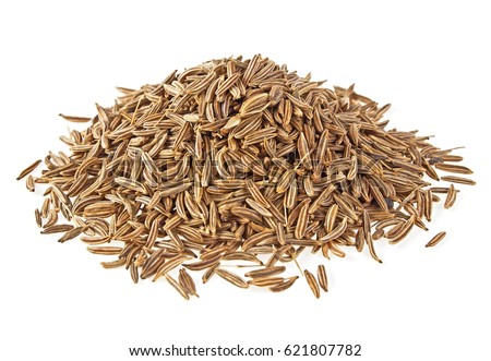 Pile of cumin seeds isolated on white background Royalty-Free Stock Photo #621807782