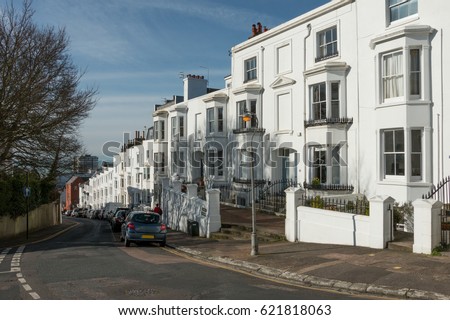 Clifton Terrace, a Georgian street in the Montpelier of Hove, East Sussex, UK, on a summer's morning Royalty-Free Stock Photo #621818063