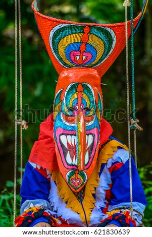 Kid dancers with ghost mask to show in Thai northeastern traditional Phi Ta Khon ghost Festival
