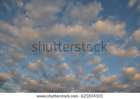 The spring sky. Fluffy clouds in the sky. Seamless sky texture