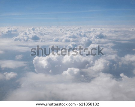 Blue sky with clouds, a view from airplane window