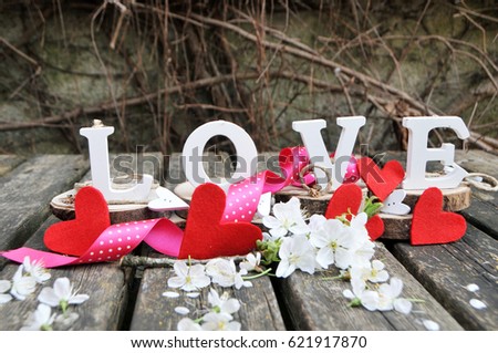 Wooden letters spelling out the word love, outdoor image.