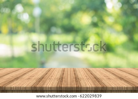 table top on blurred nature background,Space for placing products