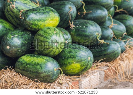 Watermelons in the Vietnamese market. Asian food concept