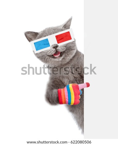 Happy cat in the 3d glasses pointing at empty board. isolated on white background