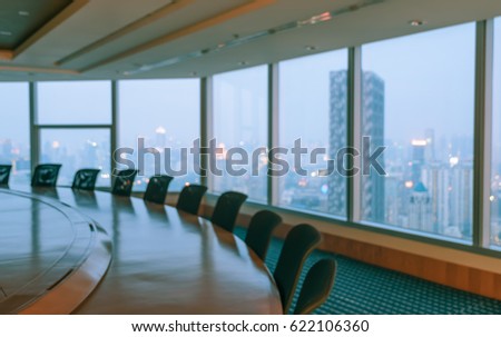 Blur image of empty boardroom with window cityscape background. Business concept Royalty-Free Stock Photo #622106360