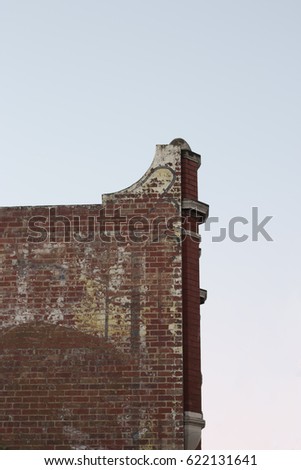 Red Brick wall and side facade 