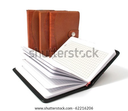 brown diaries on a white background