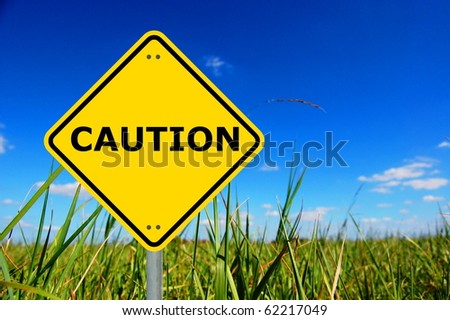 yellow caution traffic sign with copyspace for text message
