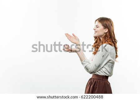 Woman on wihte background in shirt 