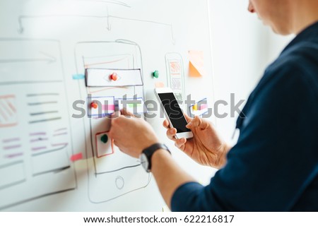 Designing application for mobile phone Royalty-Free Stock Photo #622216817
