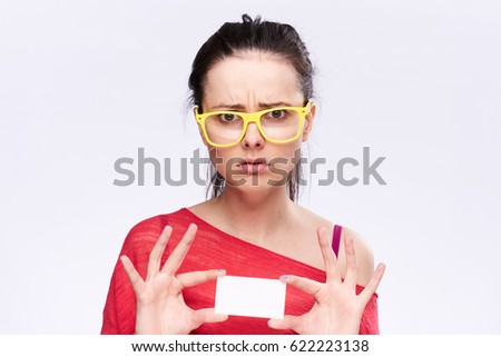   woman in glasess business card sad 