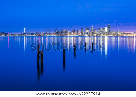 Captured from Seacrest Park in West Seattle, the bay is calm as the city awakes.